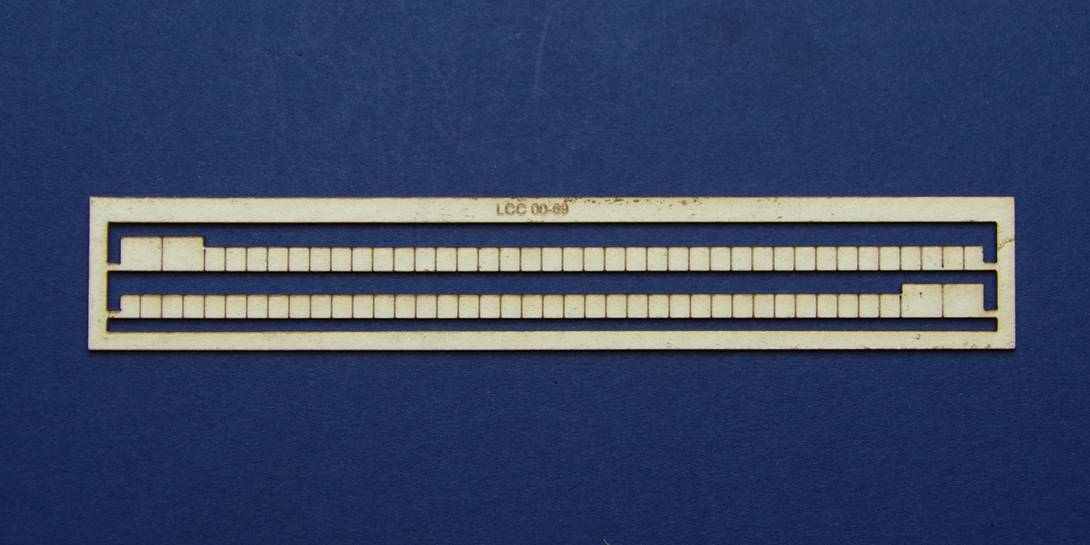 LCC 00-69 OO gauge brick arch top decoration strips Set of two decoration strips for brick arches. Glued on the top hide the joining line between LCC 00-56 and LCC 00-59.